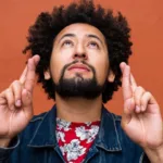 Cross Your Fingers Origin: Pagan Beliefs and Christian Symbols