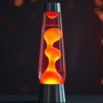 A glowing orange lava lamp with floating wax blobs against a dark background.