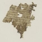 Close-up of an ancient 1,700-year-old papyrus fragment containing text from the Odyssey