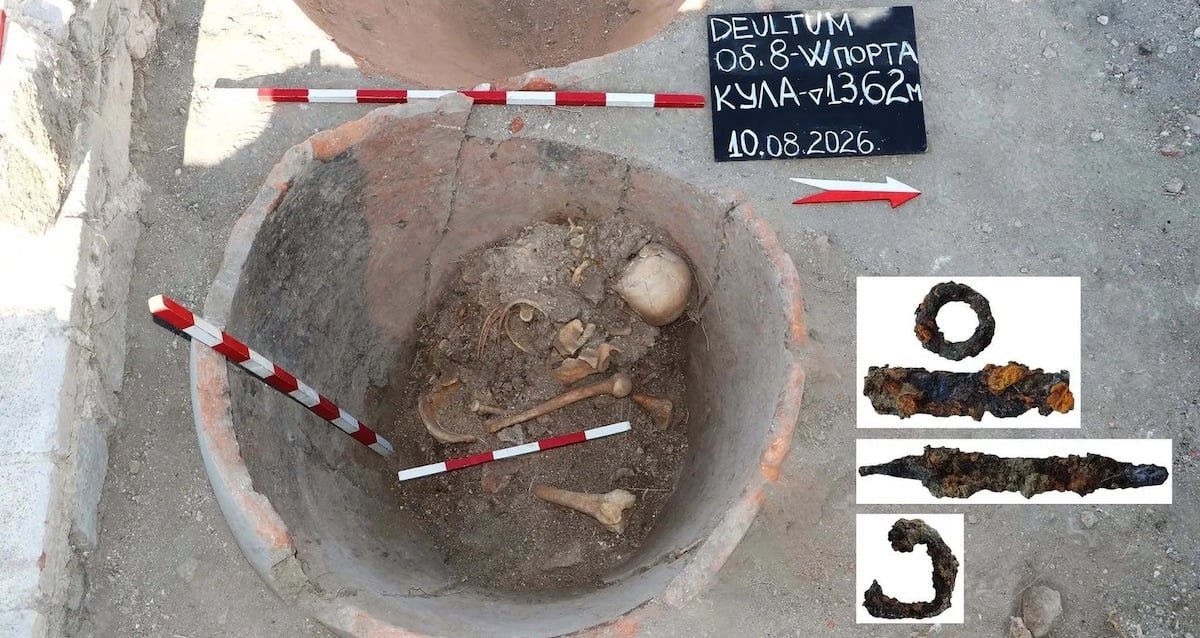 Archaeological excavation showing a Roman skeleton inside a large ceramic storage jar in Bulgaria.