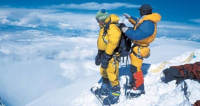 The snowy and treacherous peaks of Mount Everest during a storm