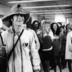 Portrait of counterculture icon Wavy Gravy in his colorful attire