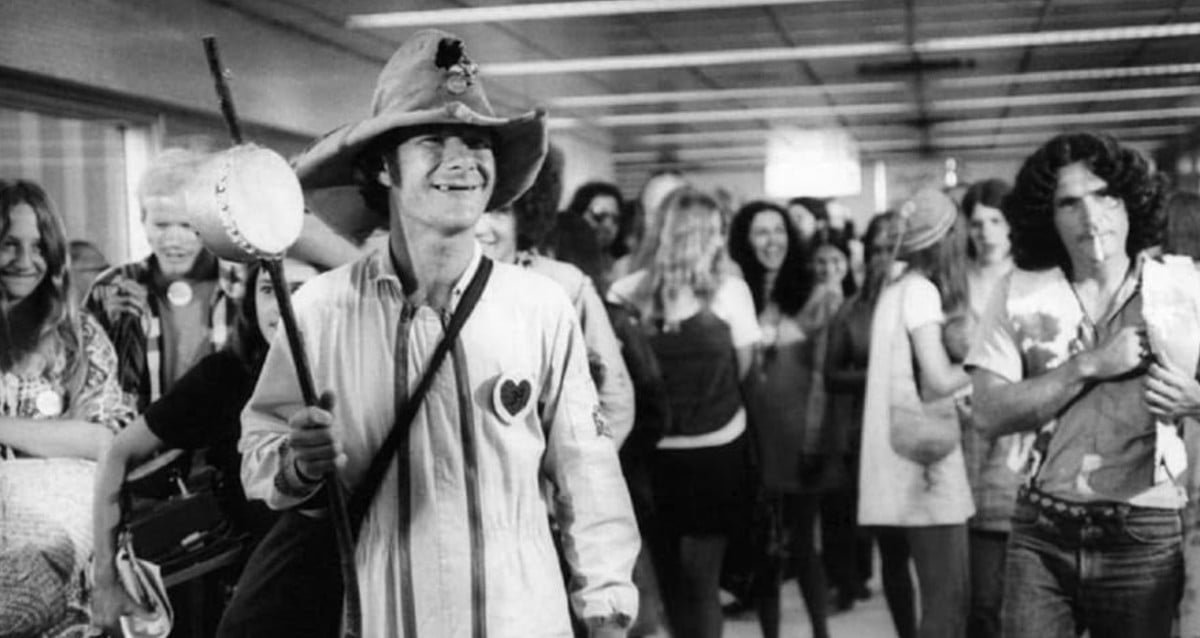 Portrait of counterculture icon Wavy Gravy in his colorful attire